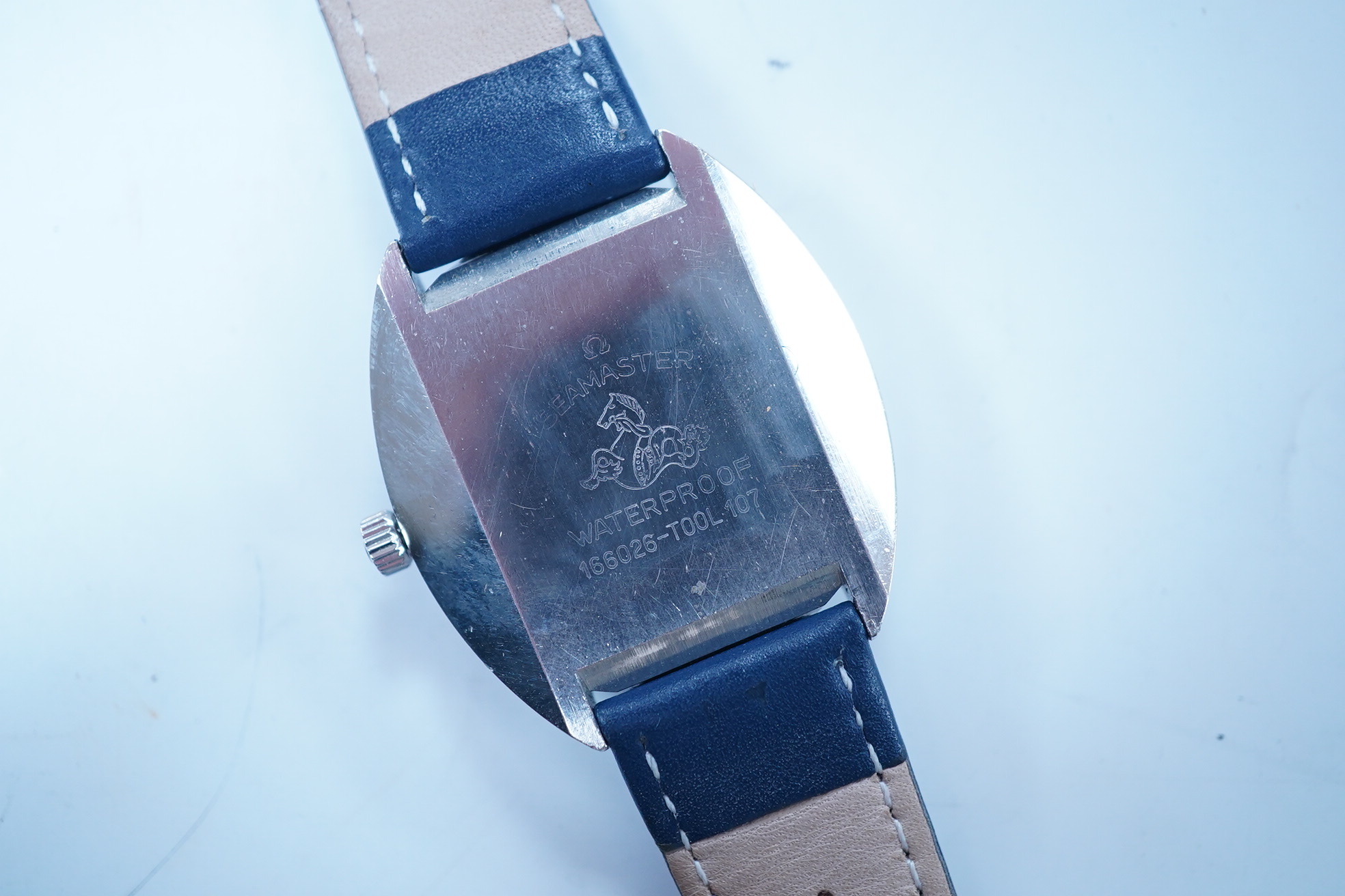 A gentleman's stainless steel Omega Seamaster Cosmic Automatic wrist watch, with baton numerals and date aperture, case diameter 35mm, on a later associated leather strap. Condition - fair